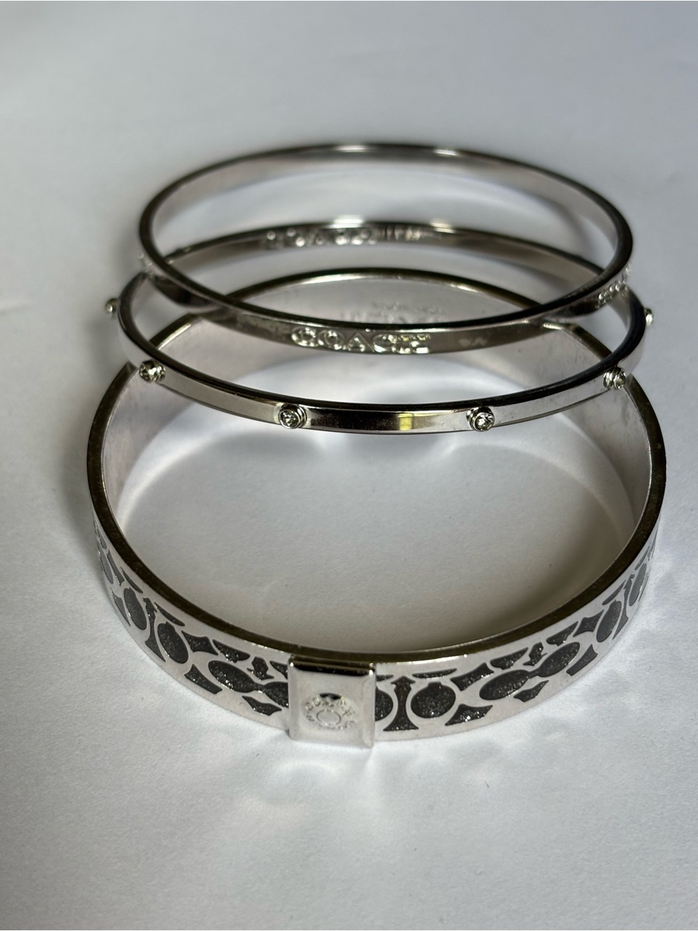 Coach silver bangle bracelet trio of 3